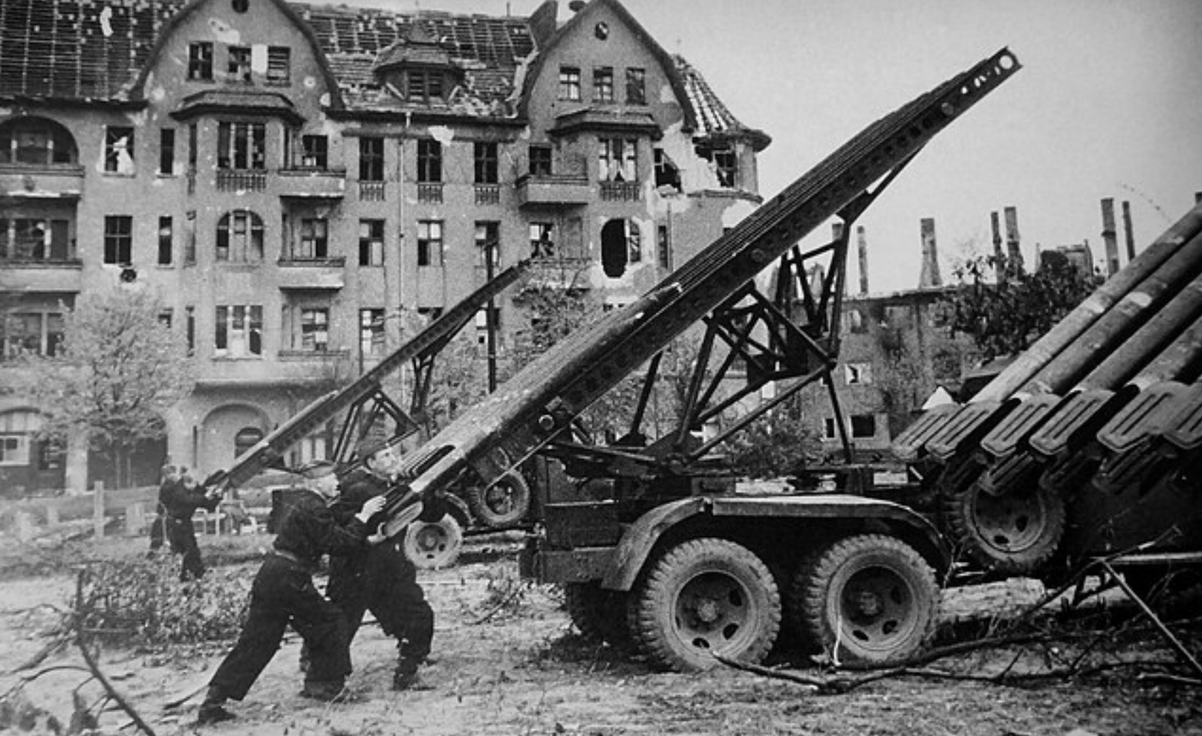 Soviet artillerymen prepare a BM-13 Katyusha rocket launcher for a salvo during fighting in Berlin. 